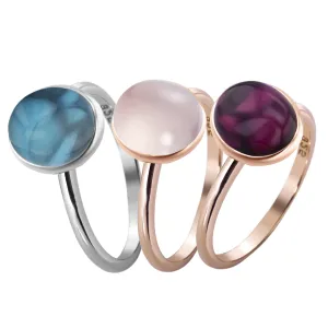Composition of rings in 925 Silver plated with Rhodium and 18k Rose Gold assembled with London Blue Topaz, Rose Quartz and Pink Tourmaline