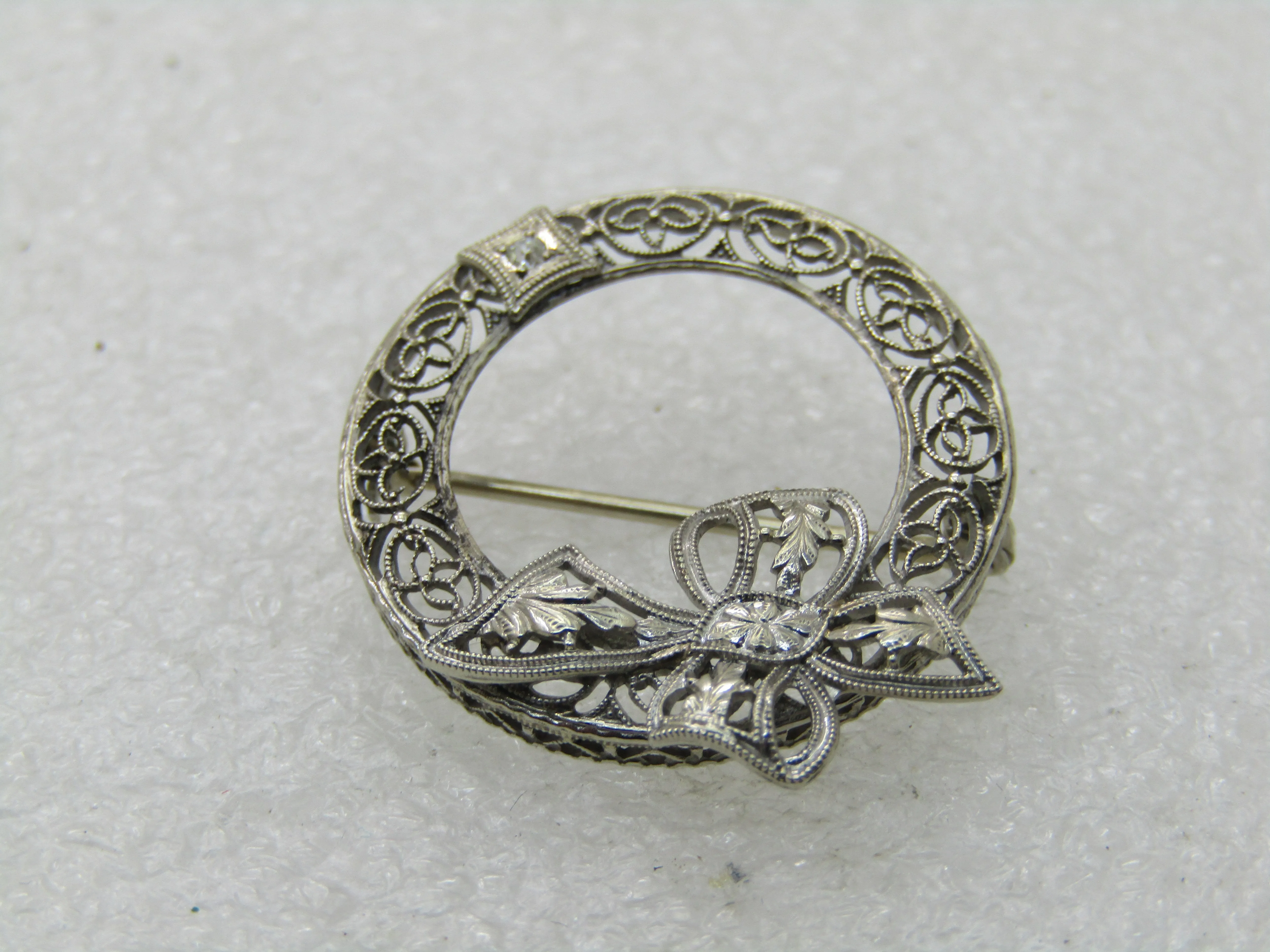 Early 1900's 14kt Filigree Diamond Brooch, Circle with Bow, 1"