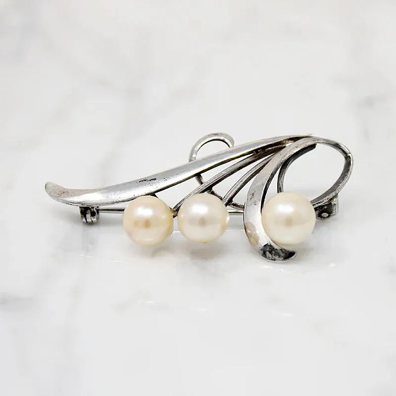 Graceful Silver Brooch with Three Pearls