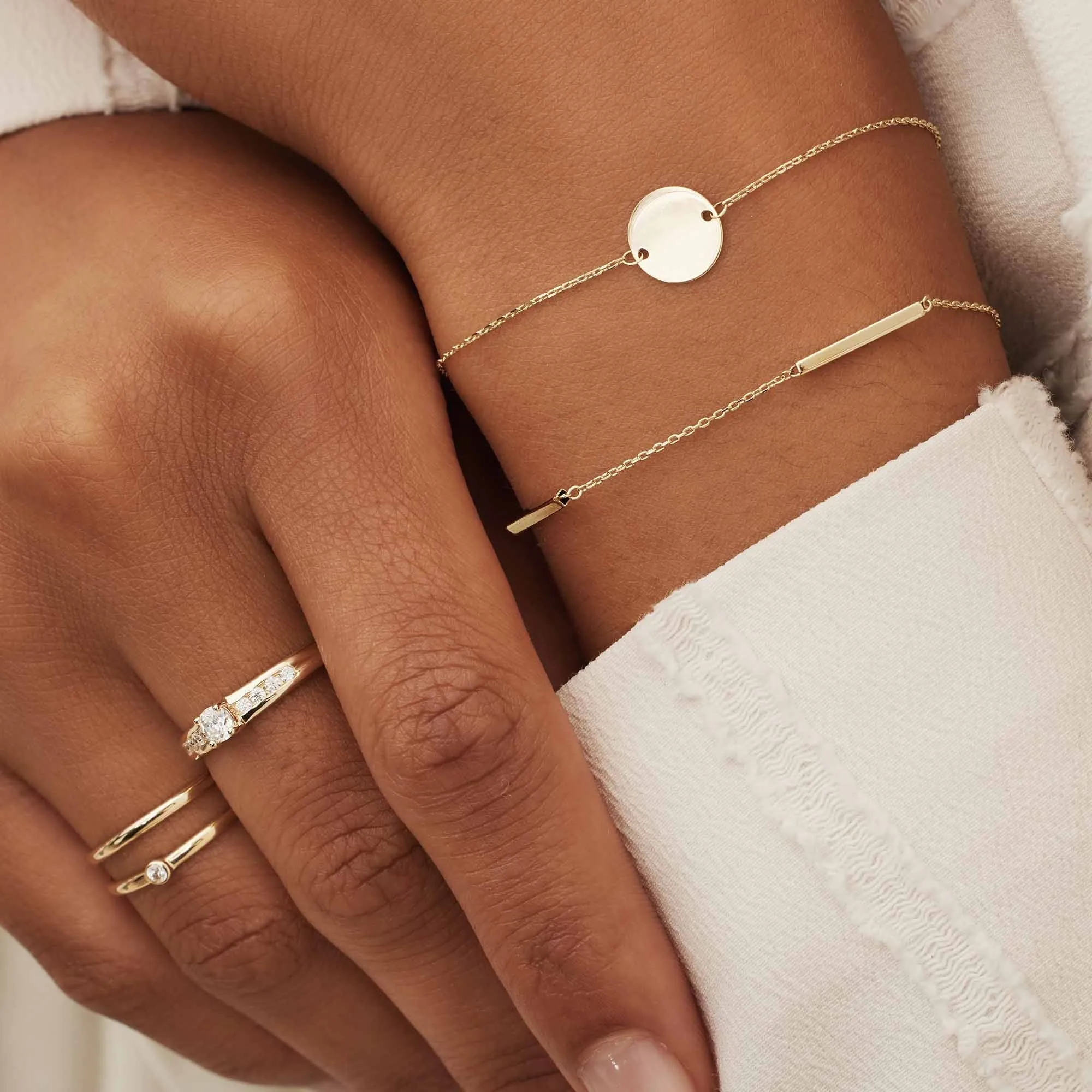Le Marais Jeanne 14 karat gold bracelet with coin