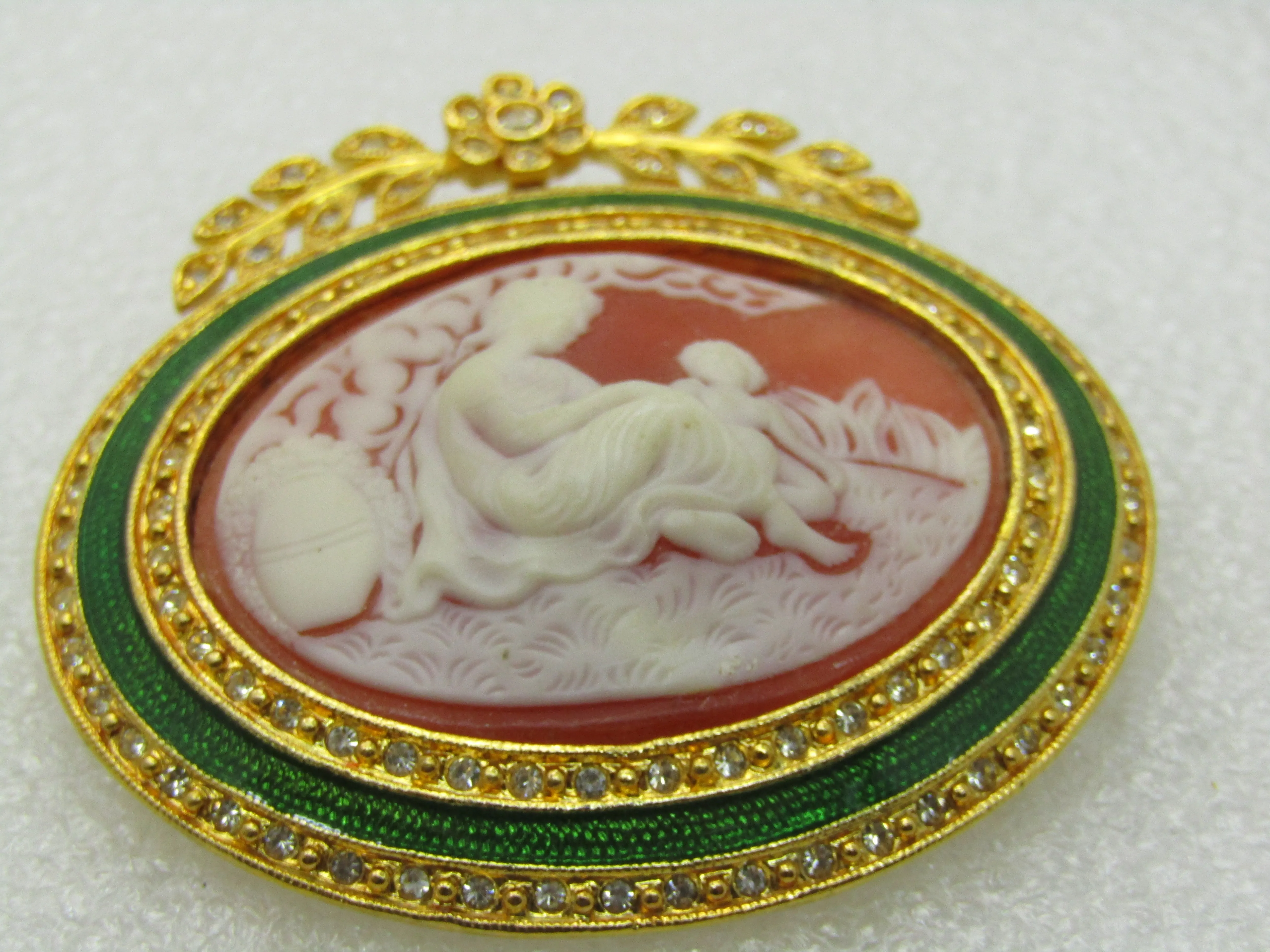 Vintage Joan Rivers Vintage Joan Rivers Enameled Rhinestone Framed Cameo Brooch, Floral Swag